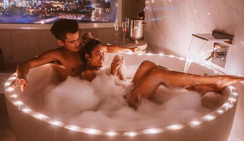 Share a romantic bath with your high end escort