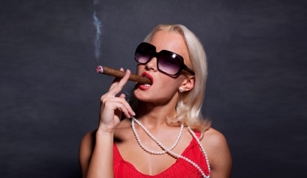 Smoking a cigar during your escort booking